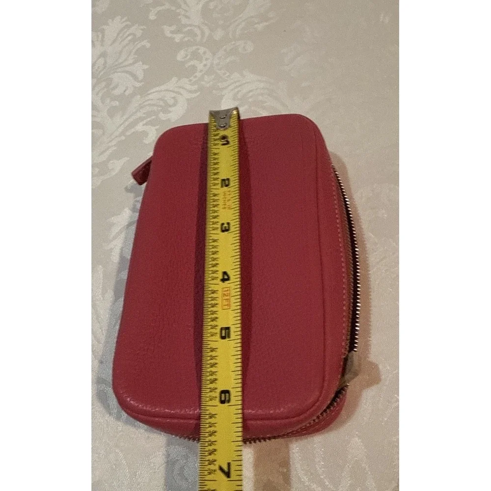 Coach hot pink zip wallet suede-lined multiple zipper compartments. 6